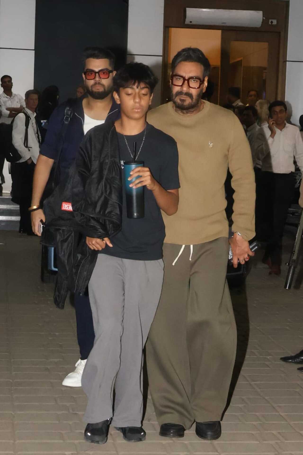 <p>Ajay Devgn was spotted with his son Yug and nephew Danish, sharing a cheerful family outing. The trio posed for paps as they returned to bay.</p> <p>Ajay Devgn was spotted with his son Yug and nephew Danish, sharing a cheerful family outing. The trio posed for paps as they returned to bay.</p>
